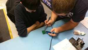 Peninsula Catholic High School Students from Foundations in Engineering STEM Program - Learning about Soldering