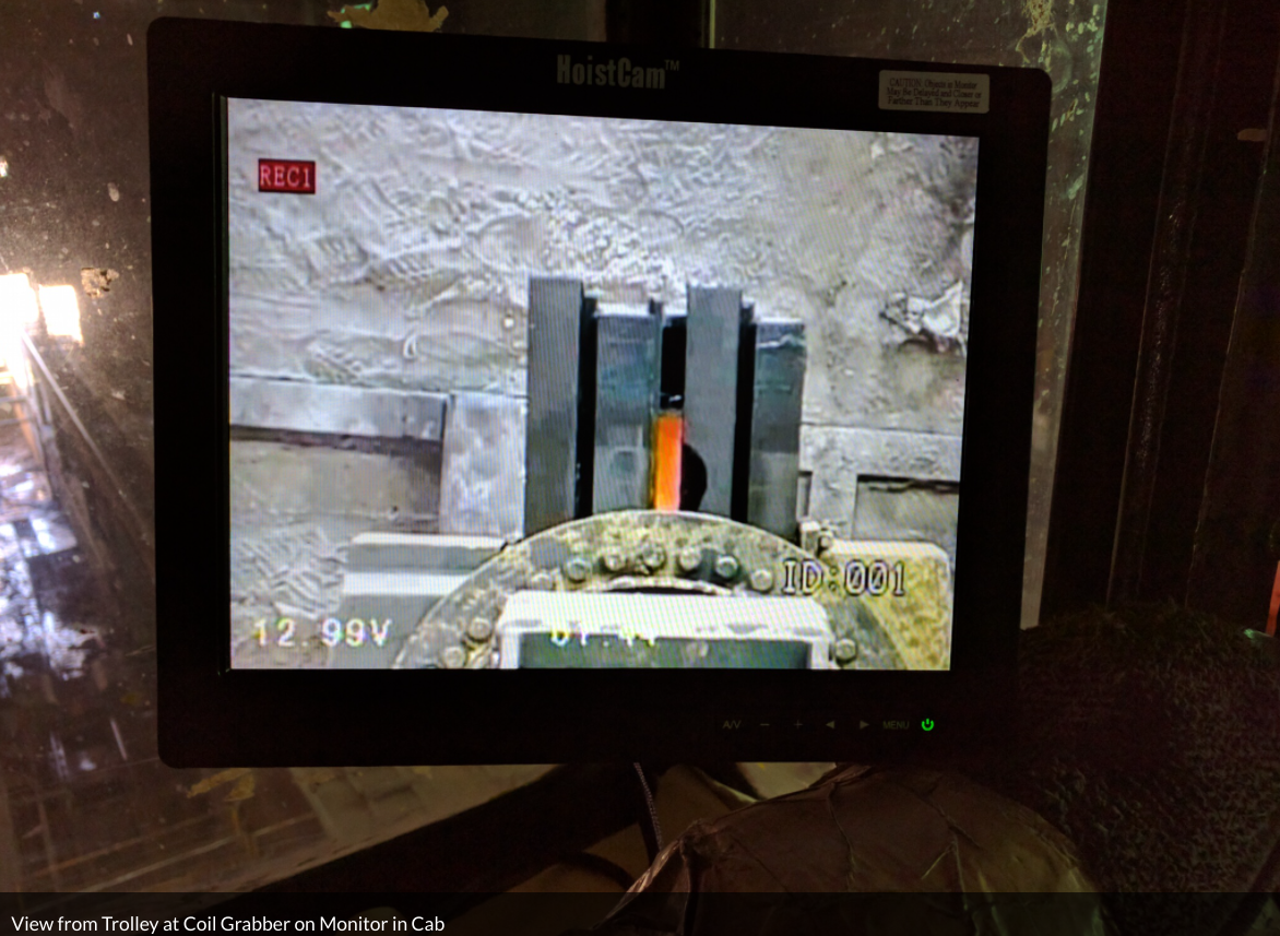View from the trolley at the coil grabber, shown on the monitor in the crane cab